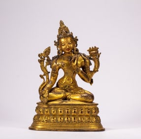 A copper gilded Buddha statue