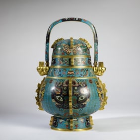 A Cloisonne Tuver With A Beam