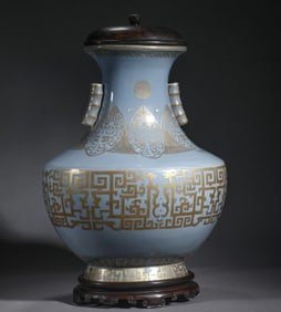 Blue glazed gilded ear piercing bottle