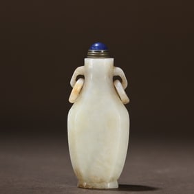 A piece of Hetian jade double-eared live ring snuff bottle