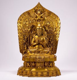 A copper gilded Buddha statue