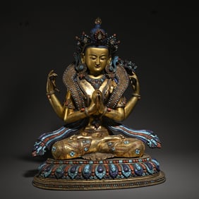 A bronze gilt inlaid treasure Guanyin study ornament