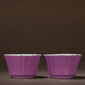 A pair of Qing Qianlong eggplant skin purple glazed spout cups
