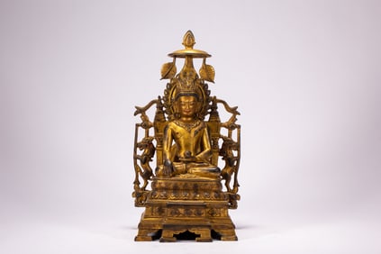 A copper gilded Buddha statue