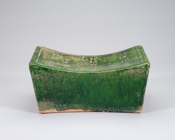 A Tang Dynasty green glazed poetry pillow