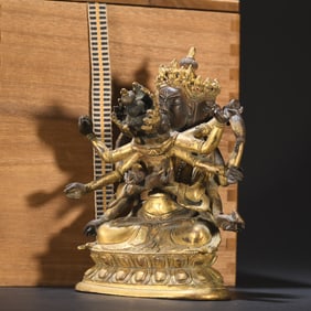 A copper gilded Tibetan Buddhist statue of joy and happiness