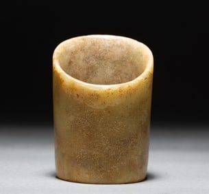 A tall antique jade ornament