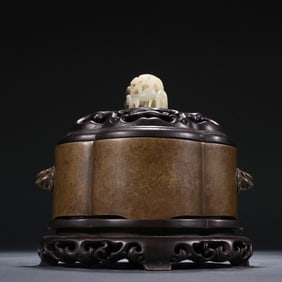 A Chang'an style copper tube crabapple shaped double lion ear incense burner