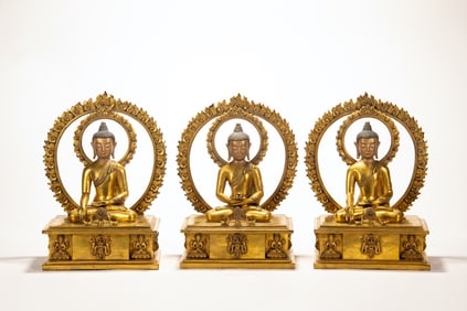 A set of copper gilded Buddha statues