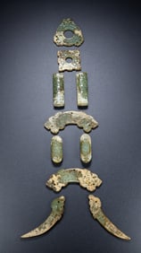 A piece of ancient jade is matched