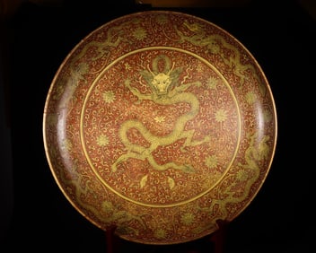 A large plate with red dragon pattern on the yellow of Jiajing of the Ming Dynasty