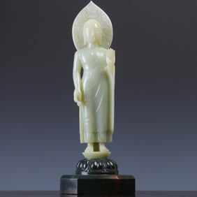 A Hotan Jade Sakyamuni statue
