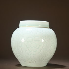 A piece of shadow blue glaze engraved pattern lid jar