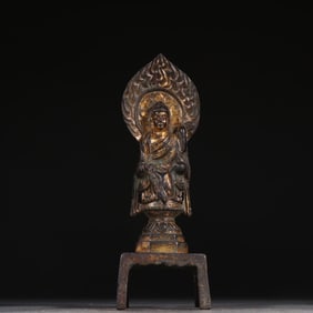 A piece of bronze gilt bench Buddha