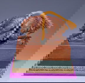 A palace aged sandalwood wood carving with a dragon button seal on one side