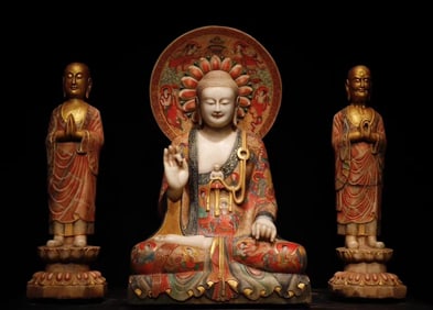 A set of white marble painted Buddha statues in the Northern Qi Dynasty