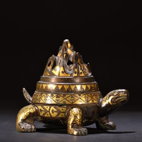 A copper inlaid gold and silver turtle shaped Boshan furnace