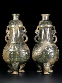 A pair of ancient jade bottles