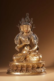 A fine bronze gilt gem-inlaid Vajrasattva seated statue