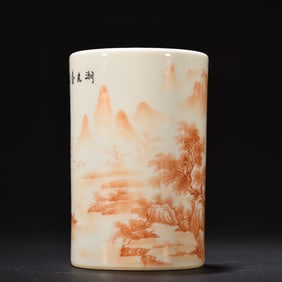 A small pavilion style alum red lake light spring pen holder