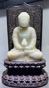 Hetian jade carved statue of Sakyamuni
