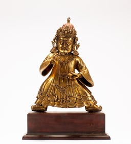 A copper gilded Buddha statue