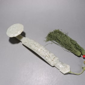 A Hotan Jade Seed Eight Immortals Ruyi Ornament