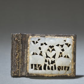 An old bronze inlaid Hetian jade carved double beast picture buckle