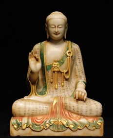 A Northern Qi white marble painted Buddha statue