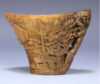 A piece of Qing Dynasty horned figure landscape cup