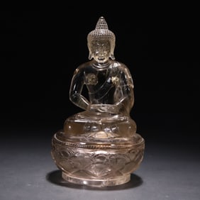 A Qing Dynasty white crystal statue of Shakyamuni