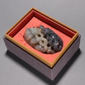 A piece of Qing Hetian blue and white seed material hollow skillfully carved double lion play ball