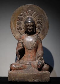 A Northern Qi bluestone painted Buddha statue