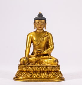 A bronze gilt Buddha statue
