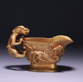 A piece of Tang bronze gilt dragon and phoenix cup