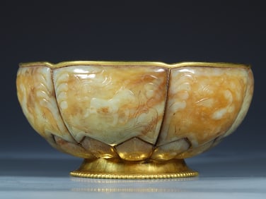 A piece of Hetian jade six divine beasts lotus wrapped copper gilt bowl