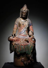 A Northern Qi bluestone painted large Guanyin seated statue