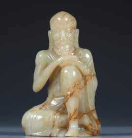 A piece of Hetian jade seed material skinny Arhat ornament