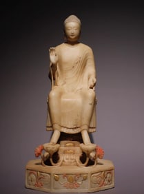 A Tang Dynasty white marble painted Buddha statue