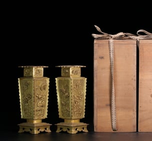 A pair of Qing Dynasty palace offices official copper-gilt diamond-shaped floral pattern square