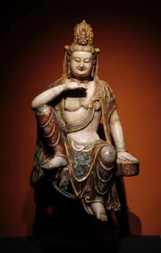 A Tang Dynasty white marble painted statue of Guanyin