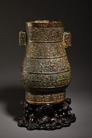 A bronze beast face through the ear bottle