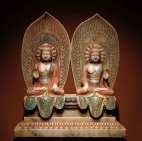 A Tang Dynasty white marble painted double Buddha seated statue