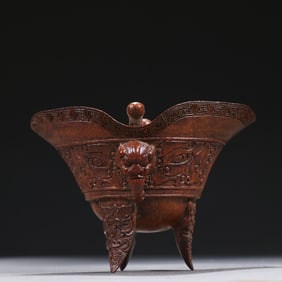 A piece of Qing bamboo carved imitation bronze jue cup