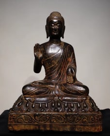 A Northern Wei bluestone painted Buddha statue