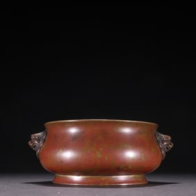 A piece of Ming Xuande year copper tire jujube red skin lion face ear circle foot incense burner