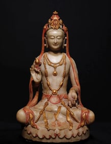 A Northern Qi white marble gilt painted Guanyin seated statue