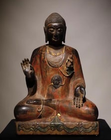 A Northern Qi bluestone painted Buddha statue