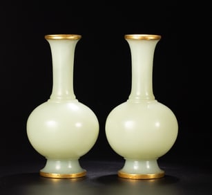 A pair of Hetian jade wrapped gold bottles