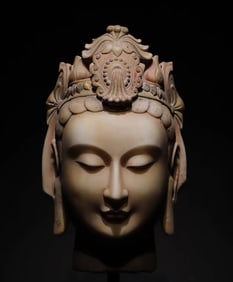 A Northern Qi white marble painted Guanyin head ornament